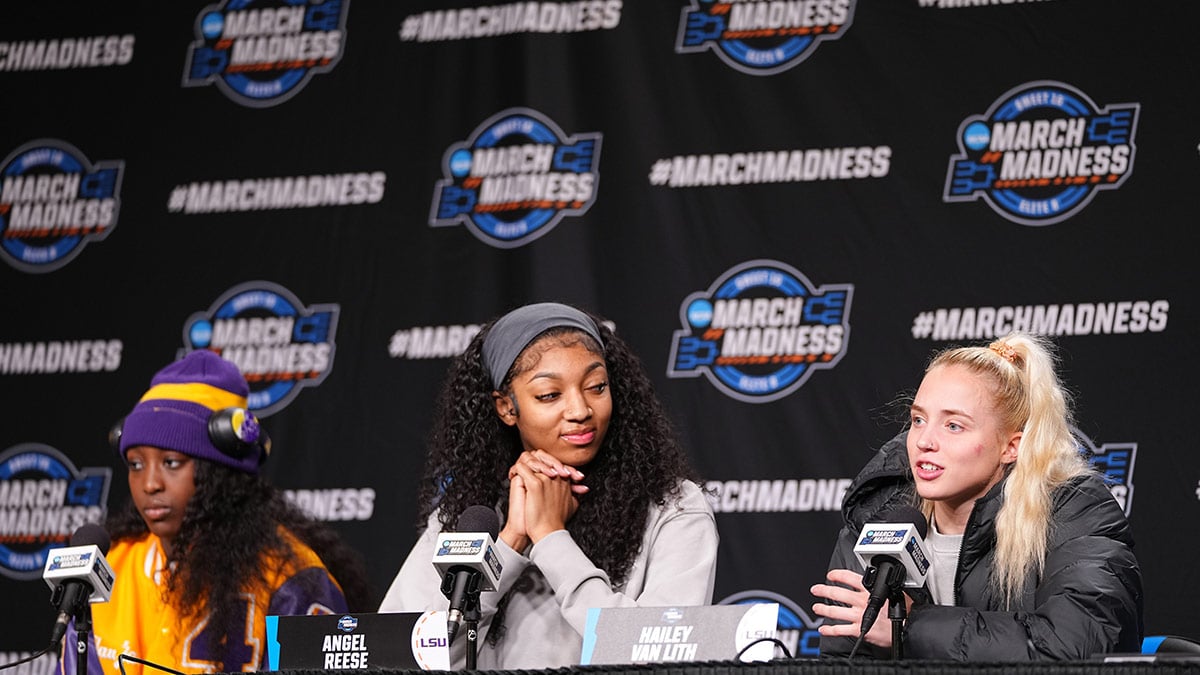 LSU Lady Tigers guard Flau'jae Johnson (4) forward Angel Reese (10) and guard Hailey Van Lith (11) take questions from the media at MVP Arena, Sunday, March 31, 2024 in Albany, N.Y.