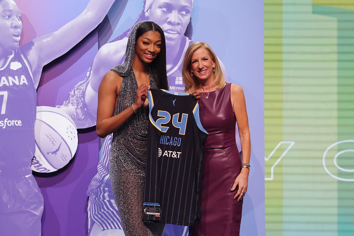 Angel Reese poses with WNBA commissioner Cathy Engelbert after she is selected with the number seven overall pick to the Chicago Sky n the 2024 WNBA Draft