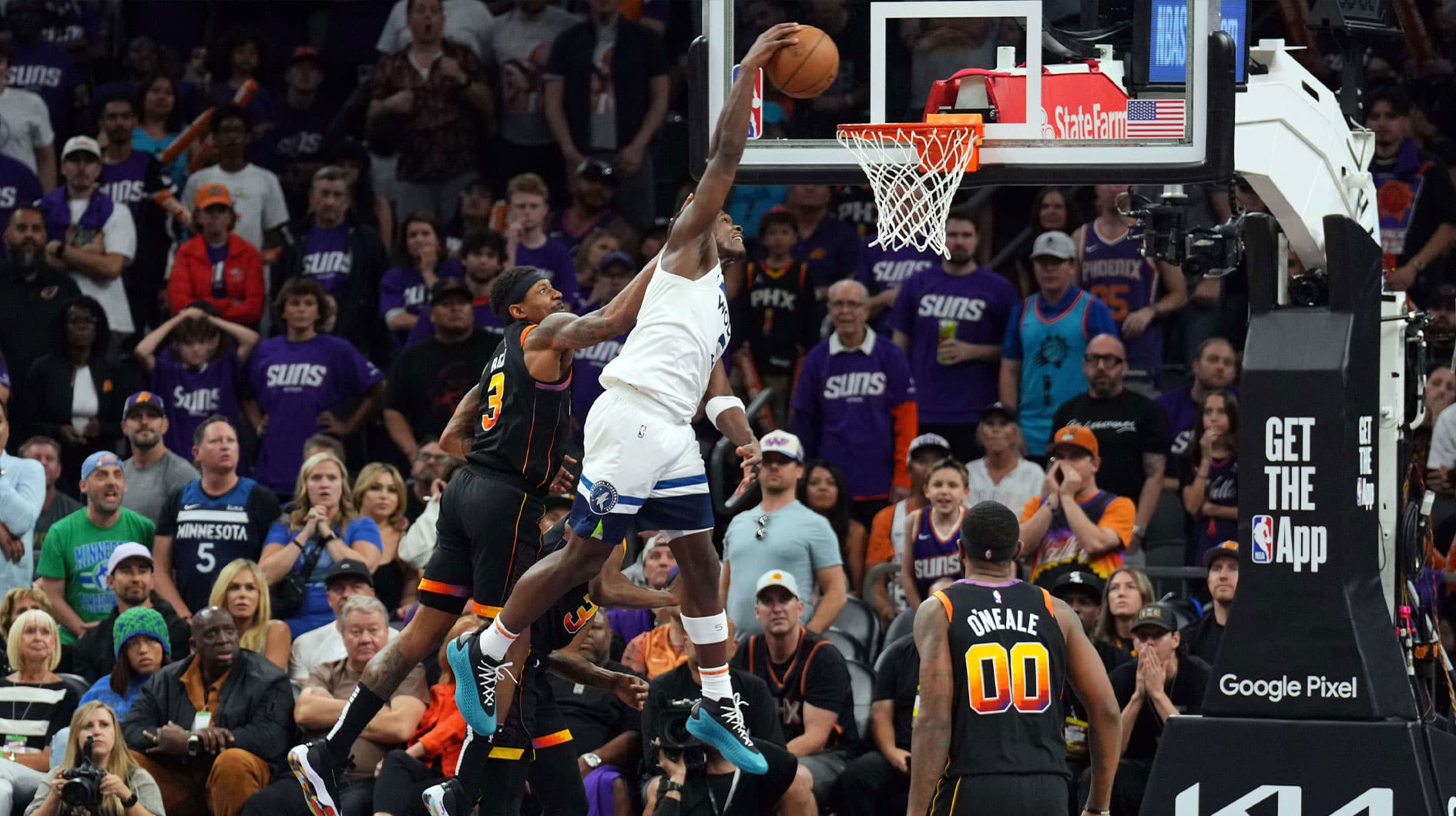 Minnesota Timberwolves guard Anthony Edwards (5) dunks against the Phoenix Suns during the second half of game four of the first round for the 2024 NBA playoffs at Footprint Center