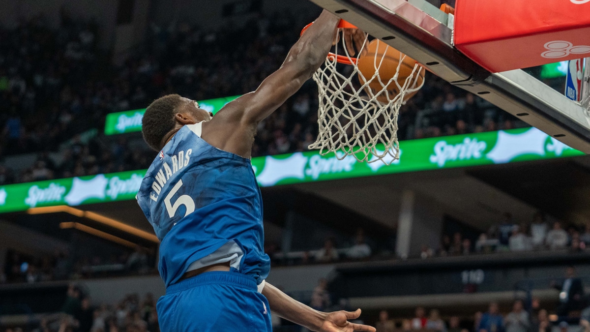 Minnesota Timberwolves guard Anthony Edwards (5) dunks in the third quarter against the Washington Wizards at Target Center