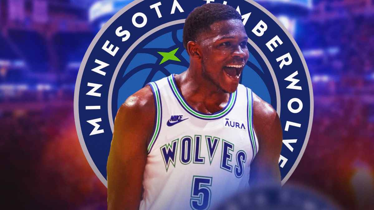 Timberwolves' guard Anthony Edwards looks hyped, Suns' Bradley Beal, referee stand in background