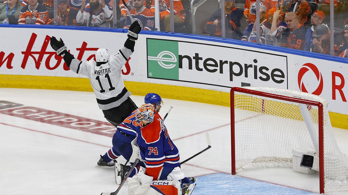 Los Angeles Kings forward Anze Kopitar (11) scores the game winning goal during overtime against Edmonton Oilers goaltender Stuart Skinner (74) in game two of the first round of the 2024 Stanley Cup Playoffs at Rogers Place