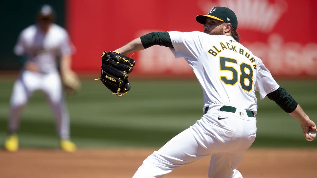 Oakland Athletics starting pitcher Paul Blackburn (58) delivers a pitch against the St. Louis Cardinals during the second inning at Oakland-Alameda County Coliseum.