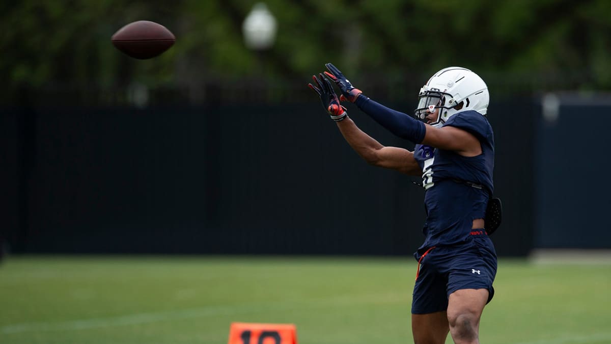 Auburn Tigers wide receiver Jay Fair (5) runs through drills during practice at Woltosz Football Performance Center in Auburn, Ala., on Tuesday, April 2, 2024.