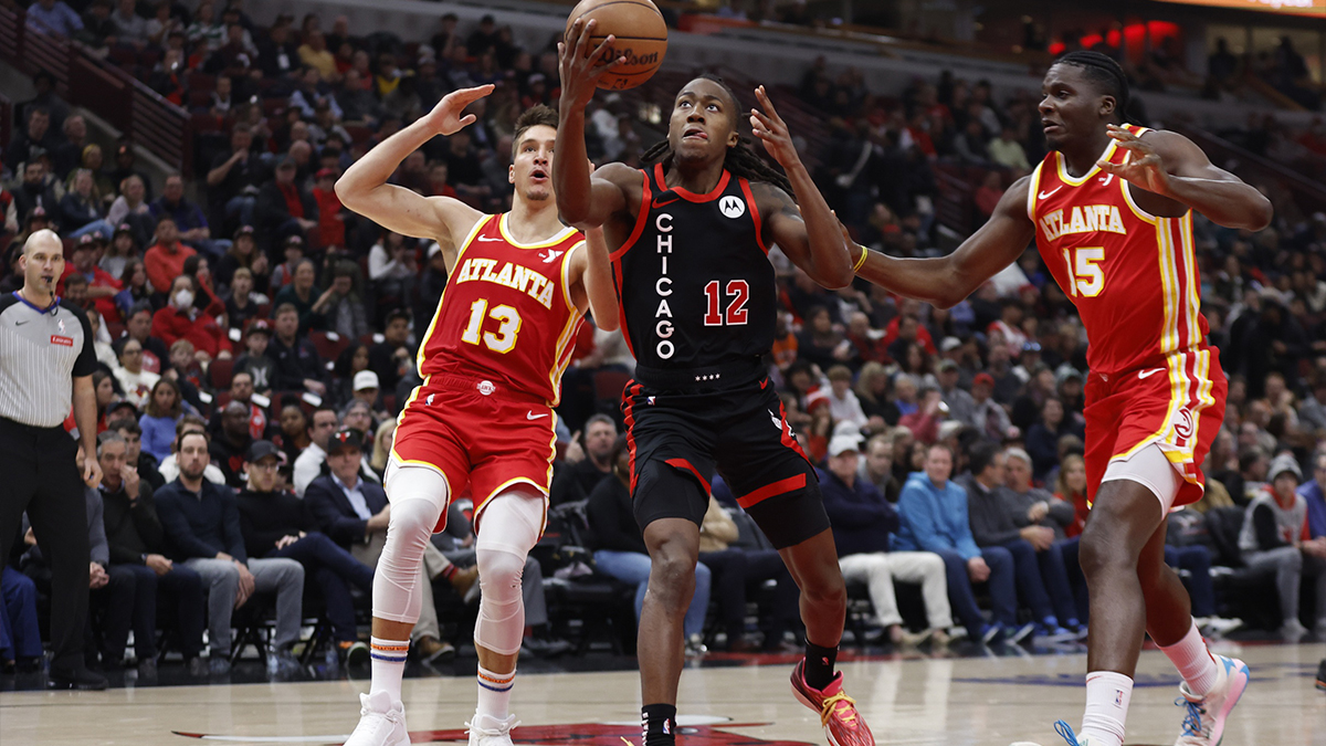 Chicago Bulls guard Ayo Dosunmu (12) goes to the basket against the Atlanta Hawks during the first half at United Center.