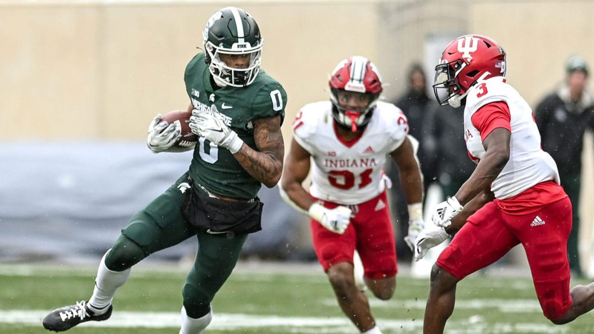 Michigan State's Keon Coleman, left, runs after a catch as Indiana's Tiawan Mullen closes in during the fourth quarter on Saturday, Nov. 19, 2022, at Spartan Stadium in East Lansing.
