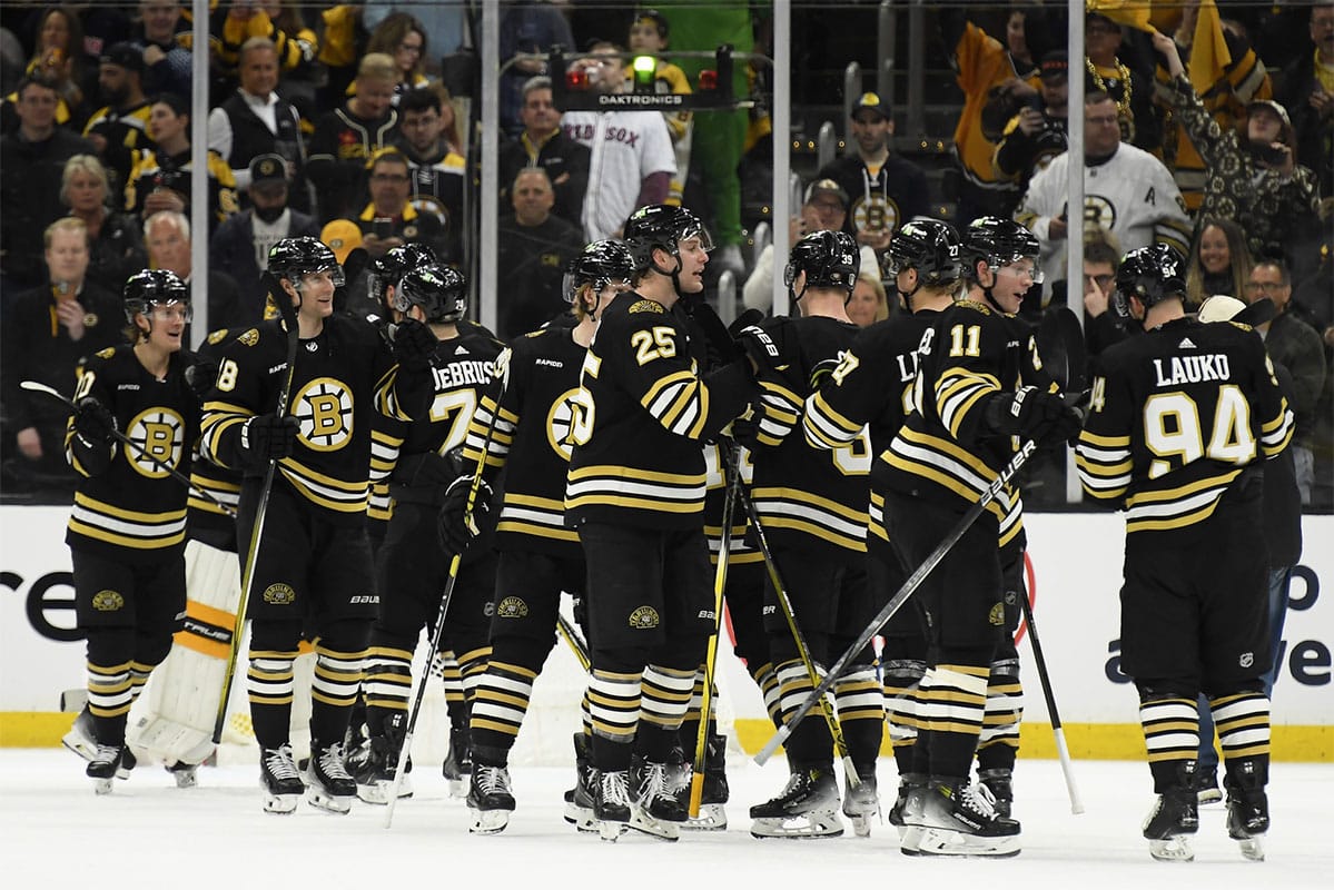 The Boston Bruins celebrate after defeating the Toronto Maple Leafs in game one of the first round of the 2024 Stanley Cup Playoffs at TD Garden.