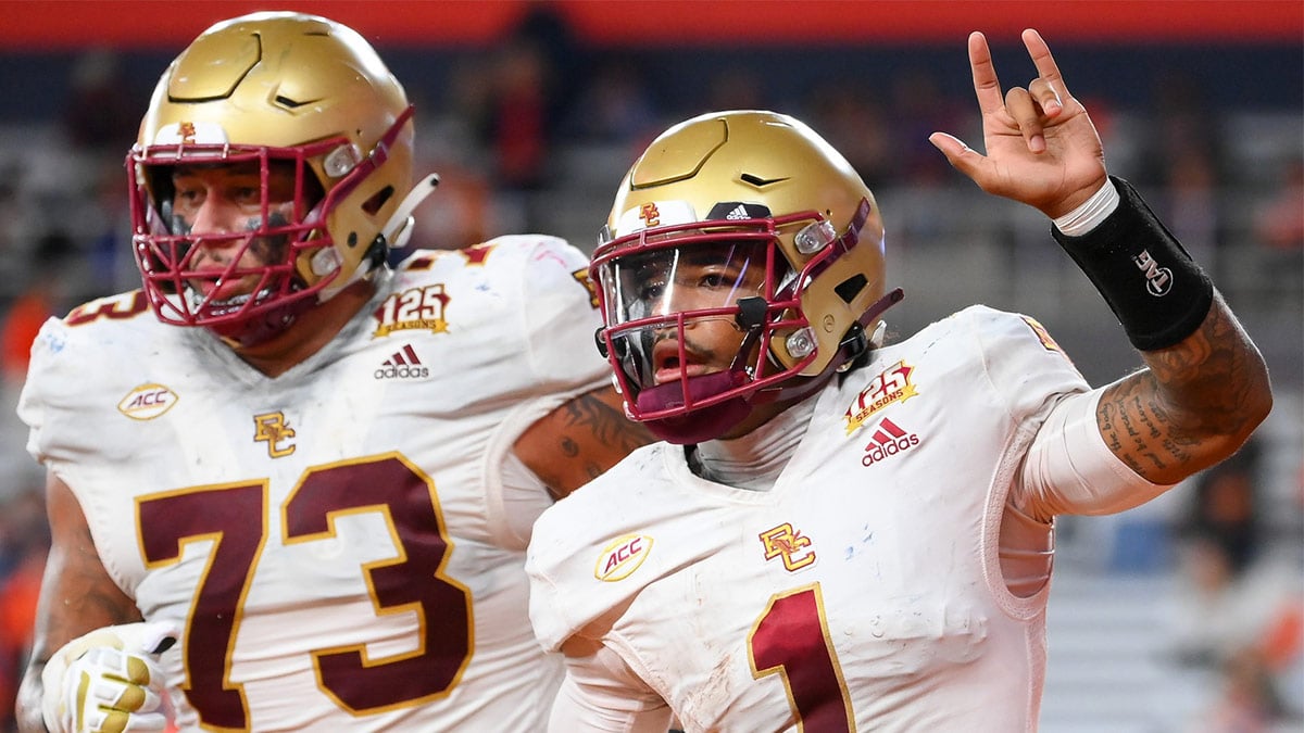 Boston College Eagles quarterback Thomas Castellanos (1) celebrates his touchdown run with teammate offensive lineman Christian Mahogany (73) against the Syracuse Orange during the second half at the JMA Wireless Dome