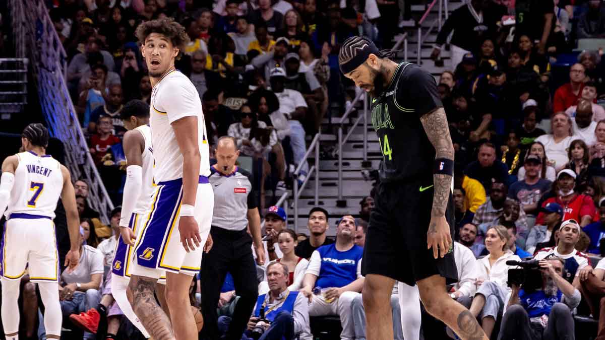 Los Angeles Lakers center Jaxson Hayes (11) looks back at New Orleans Pelicans forward Brandon Ingram (14) after a play during the second half at Smoothie King Center.