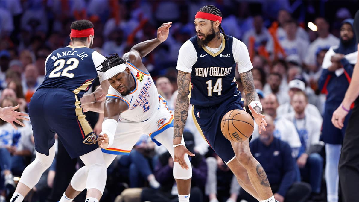 New Orleans Pelicans forward Brandon Ingram (14) drives around Oklahoma City Thunder guard Luguentz Dort (5) during the fourth quarter of game one of the first round for the 2024 NBA playoffs at Paycom Center