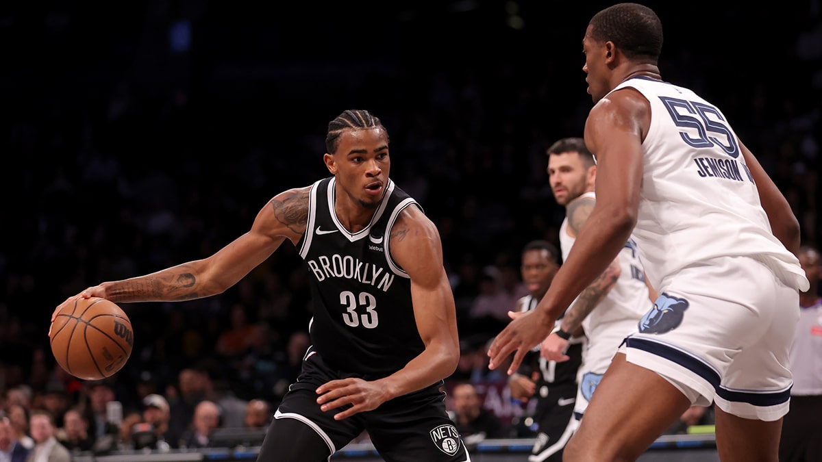 Brooklyn Nets center Nic Claxton (33) controls the ball against Memphis Grizzlies center Trey Jemison (55) during the first quarter at Barclays Center.