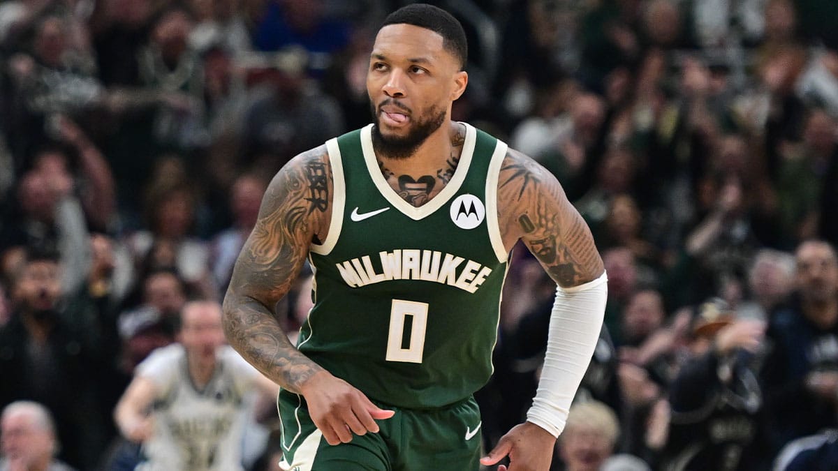 Apr 21, 2024; Milwaukee, Wisconsin, USA; Milwaukee Bucks guard Damian Lillard (0) reacts after scoring a basket in the in the second quarter against the Indiana Pacers during game one of the first round for the 2024 NBA playoffs at Fiserv Forum. 