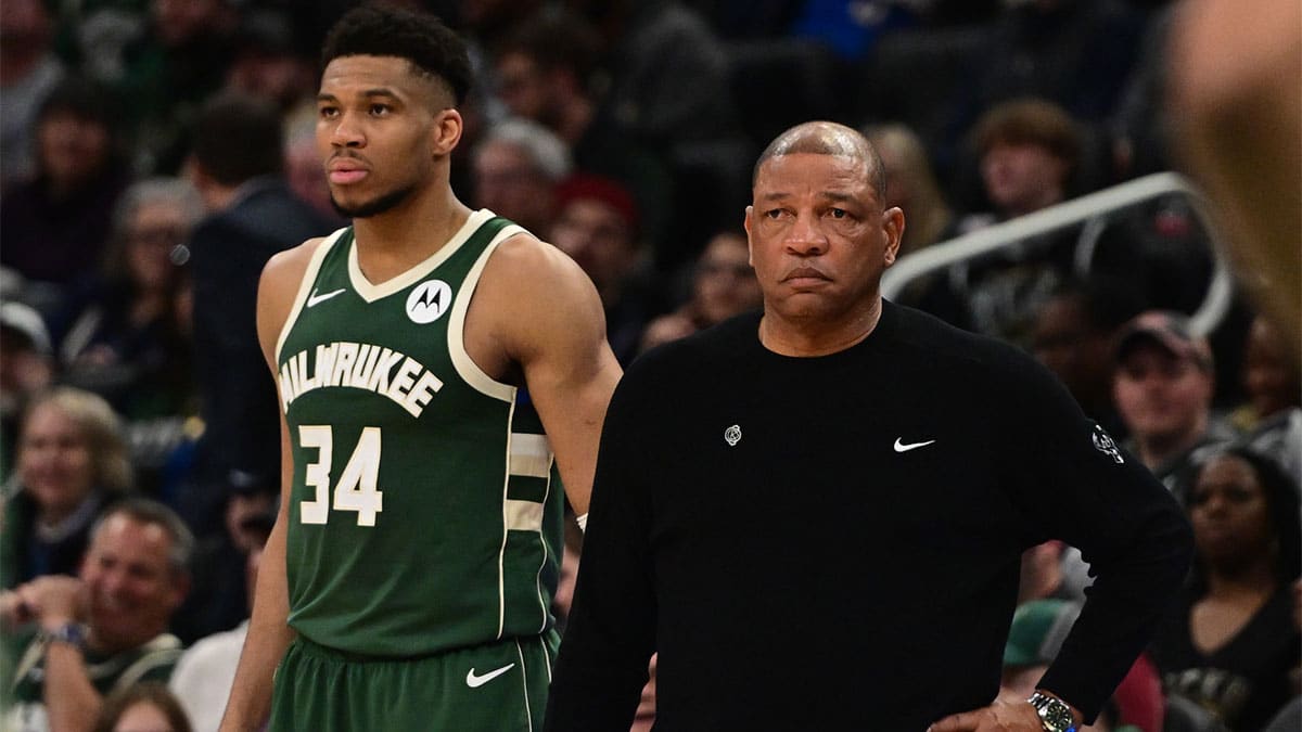 Bucks head coach Doc Rivers and forward Giannis Antetokounmpo (34) looks on in the fourth quarter