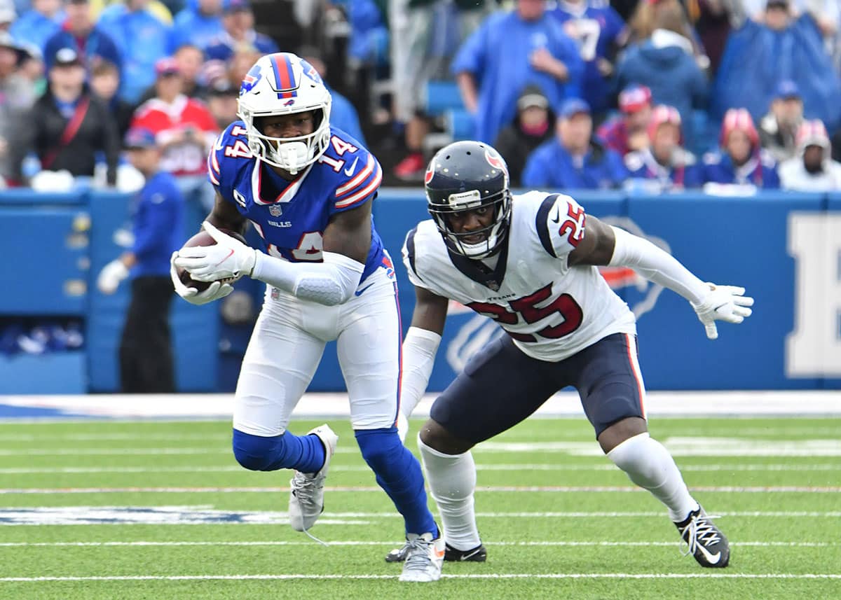 Buffalo Bills wide receiver Stefon Diggs (14) moves past Houston Texans defensive back Desmond King (25) after a catch in the third quarter at Highmark Stadium. 