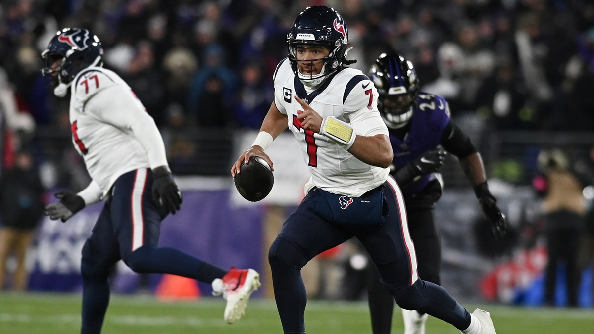Houston Texans quarterback C.J. Stroud (7) runs the ball against the Baltimore Ravens during the second quarter of a 2024 AFC divisional round game at M&T Bank Stadium.