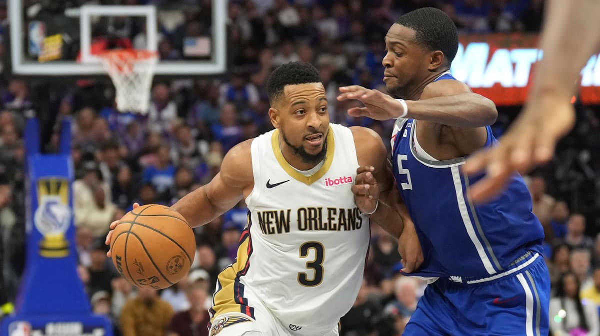  New Orleans Pelicans guard CJ McCollum (3) dribbles against Sacramento Kings guard De'Aaron Fox (5) during the fourth quarter at Golden 1 Center. 