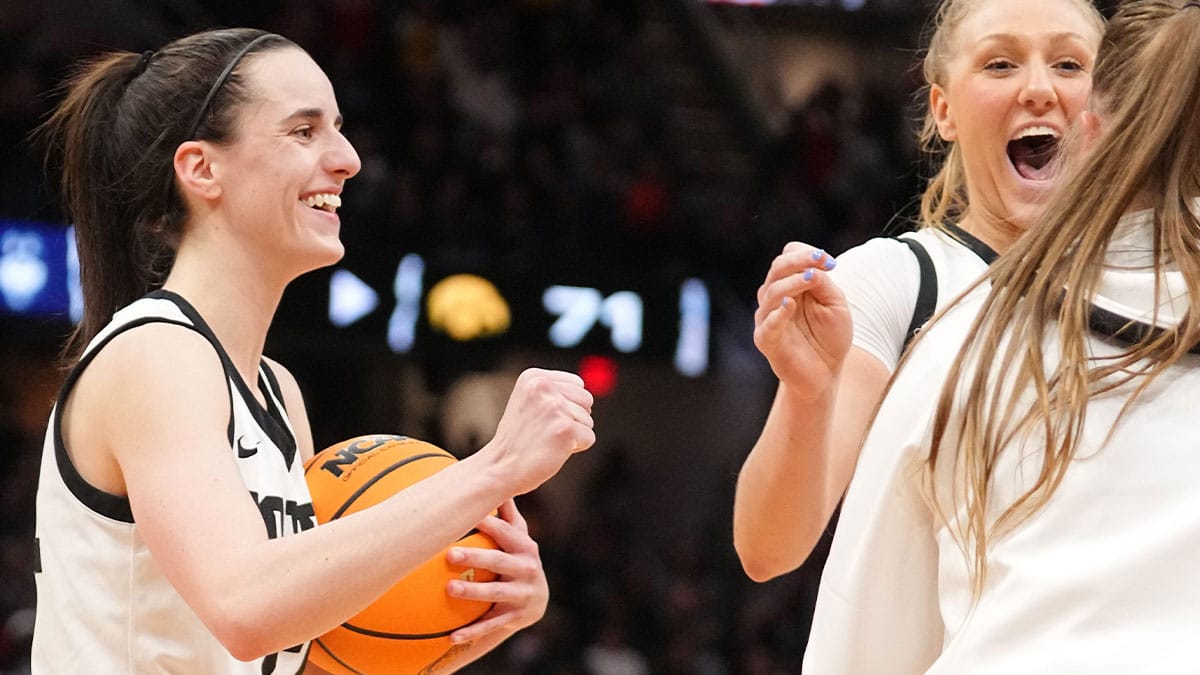 Iowa Hawkeyes guard Caitlin Clark (22) and Iowa Hawkeyes guard Sydney Affolter (3) celebrate after winning the Final Four round of the NCAA Women's Basketball Tournament between Iowa and UConn at Rocket Mortgage Fieldhouse
