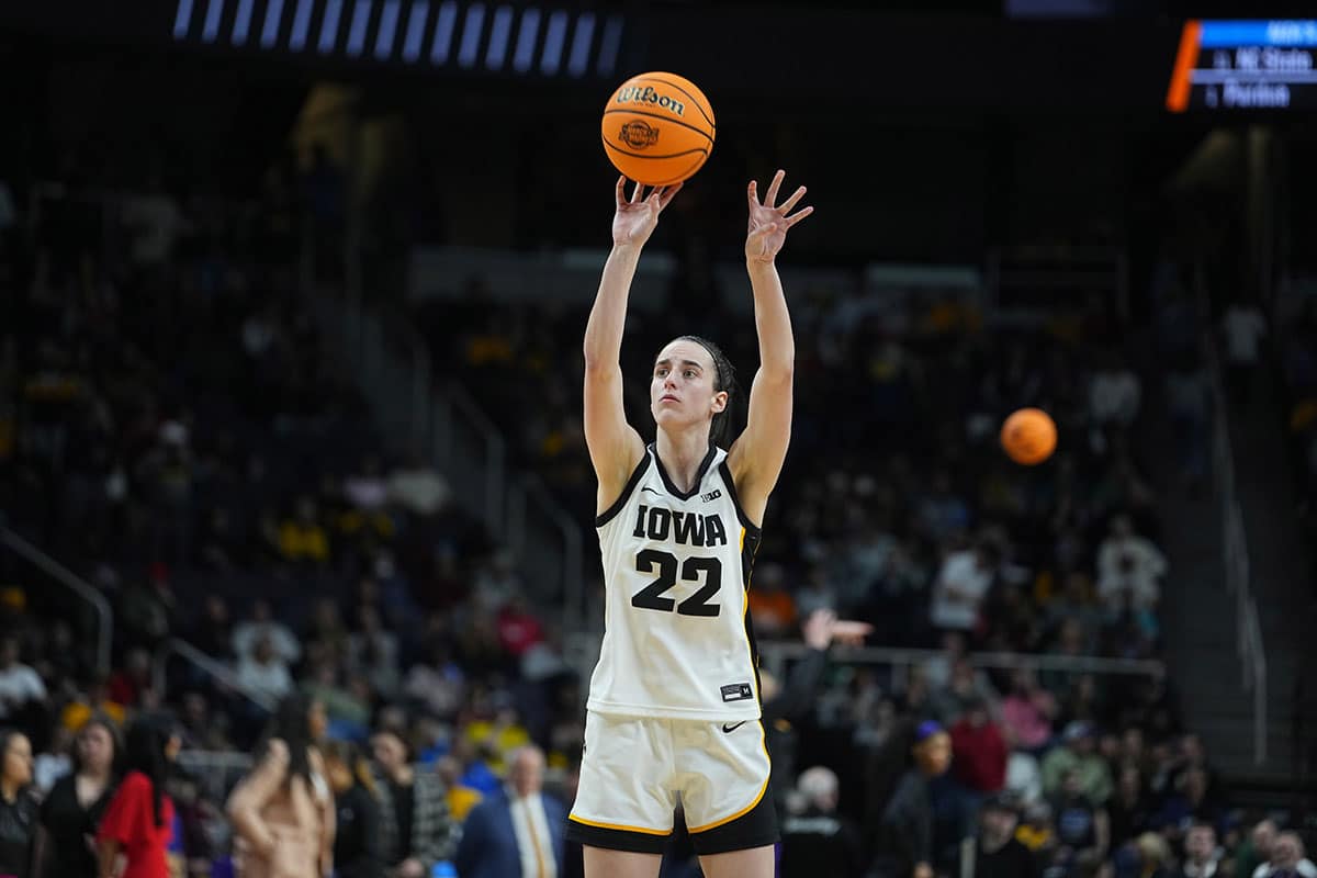 Iowa Hawkeyes guard Caitlin Clark (22) shoots in the third quarter against the LSU Lady Tigers in the finals of the Albany Regional in the 2024 NCAA Tournament at MVP Arena.