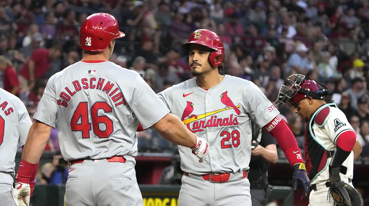 St. Louis Cardinals third base Nolan Arenado (28) celebrates with first base Paul Goldschmidt (46) after hitting a three run home run against the Arizona Diamondbacks in the first inning at Chase Field. 