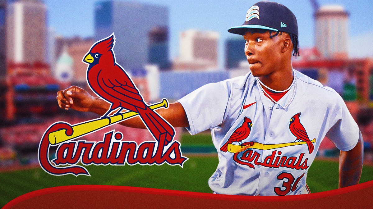 Tink Hence next to a Cardinals logo at Busch Stadium