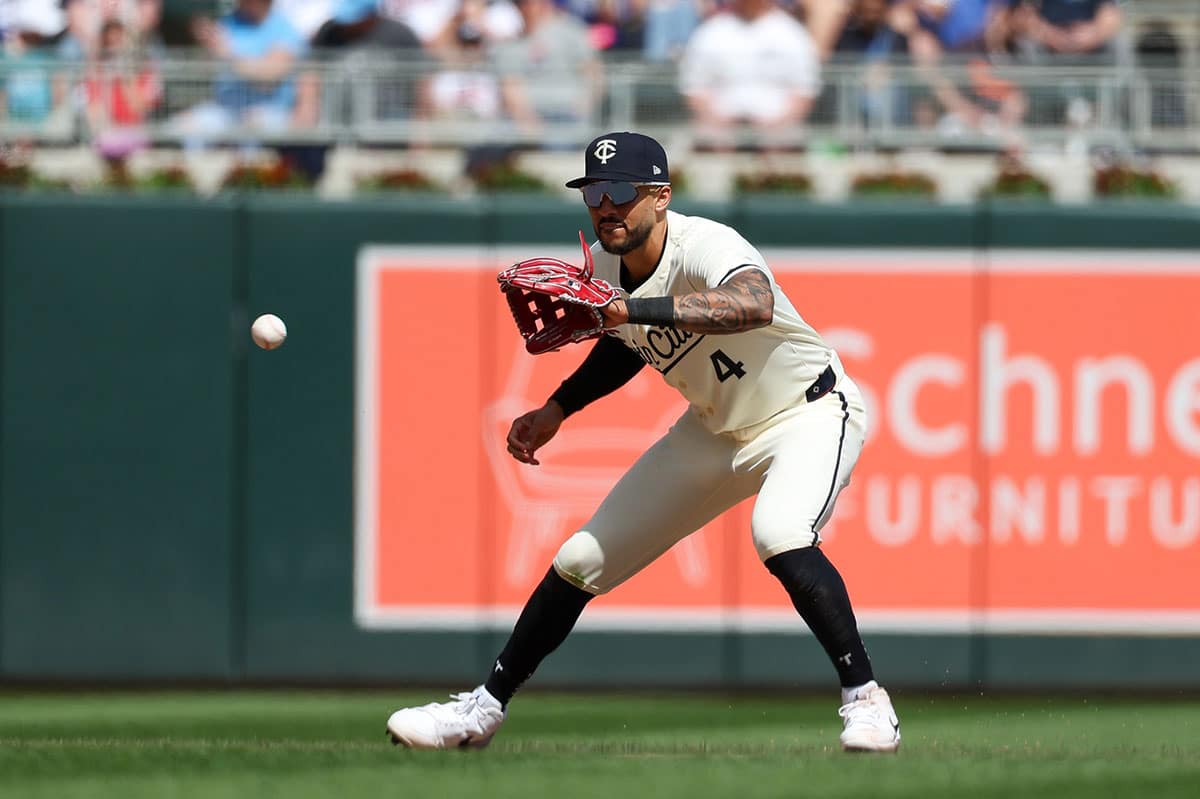 Minnesota Twins shortstop Carlos Correa (4) fields the ball hit by Los Angeles Dodgers second baseman Mookie Betts (not pictured) during the seventh inning at Target Field.