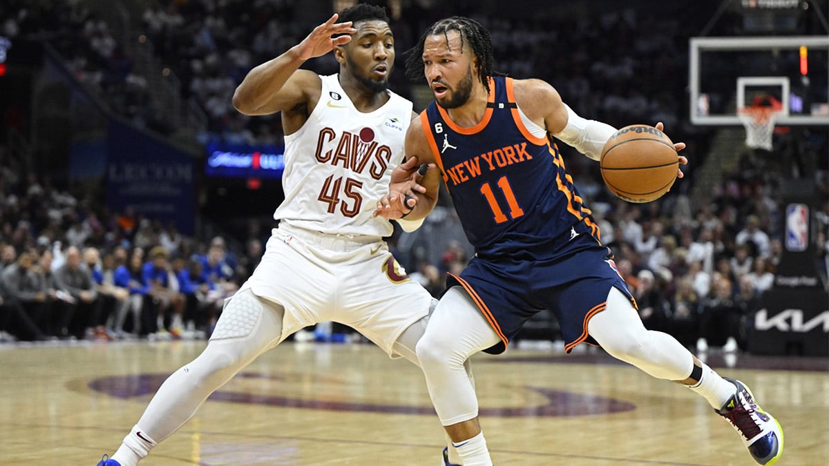 Cleveland Cavaliers guard Donovan Mitchell (45) defends New York Knicks guard Jalen Brunson (11) in the third quarter during game five of the 2023 NBA playoffs at Rocket Mortgage FieldHouse