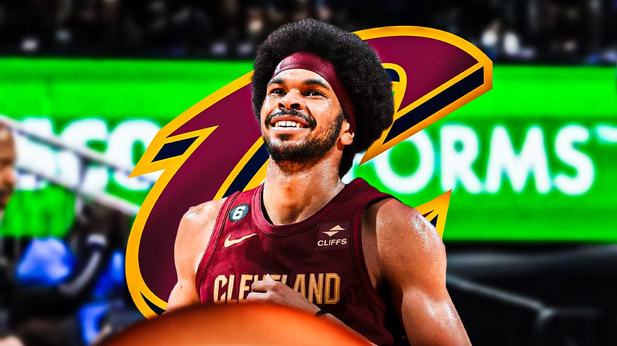 Jarrett Allen in image looking happy, Cleveland Cavaliers logo, basketball court in background
