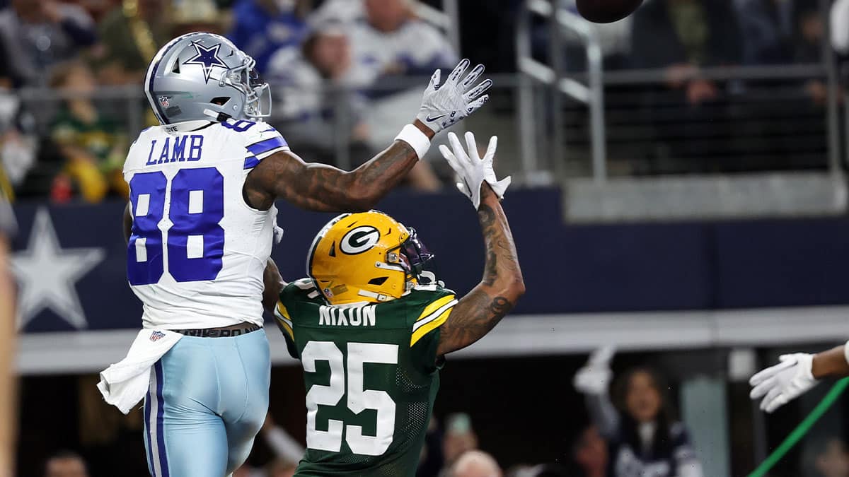 Green Bay Packers cornerback Keisean Nixon (25) break sup a pass against Dallas Cowboys wide receiver CeeDee Lamb (88) during the second half for the 2024 NFC wild card game at AT&T Stadium.
