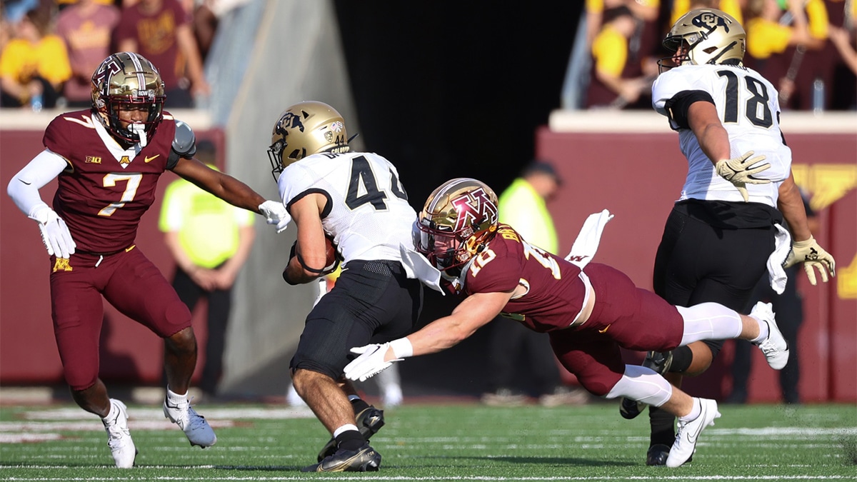 Minnesota Golden Gophers defensive back Coleman Bryson (16) tackles Colorado Buffaloes running back Charlie Offerdahl (44) during the fourth quarter at Huntington Bank Stadium.