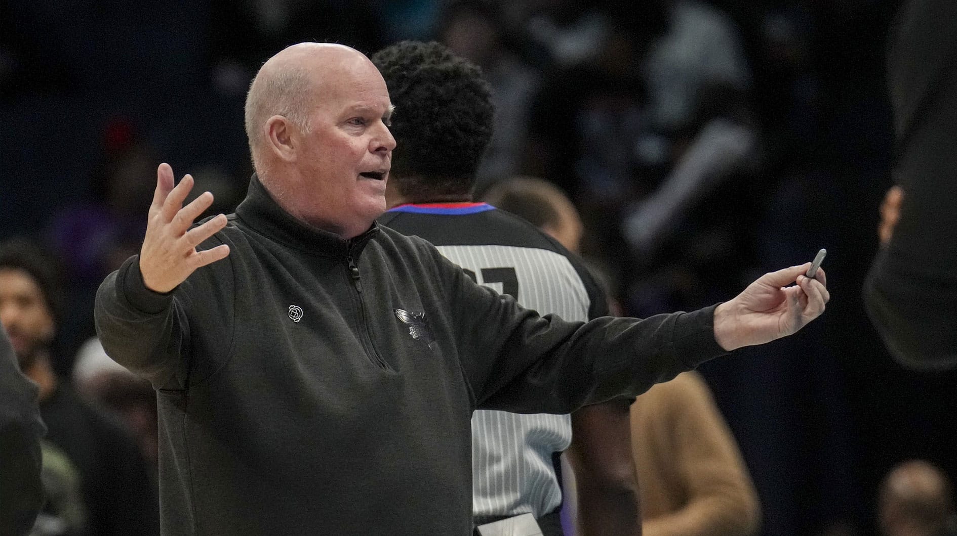 Apr 5, 2024; Charlotte, North Carolina, USA; Charlotte Hornets head coach Steve Clifford argues a call with referee Mitchell Ervin (27) during the second half against the Orlando Magic at Spectrum Center. Mandatory Credit: Jim Dedmon-USA TODAY Sports
