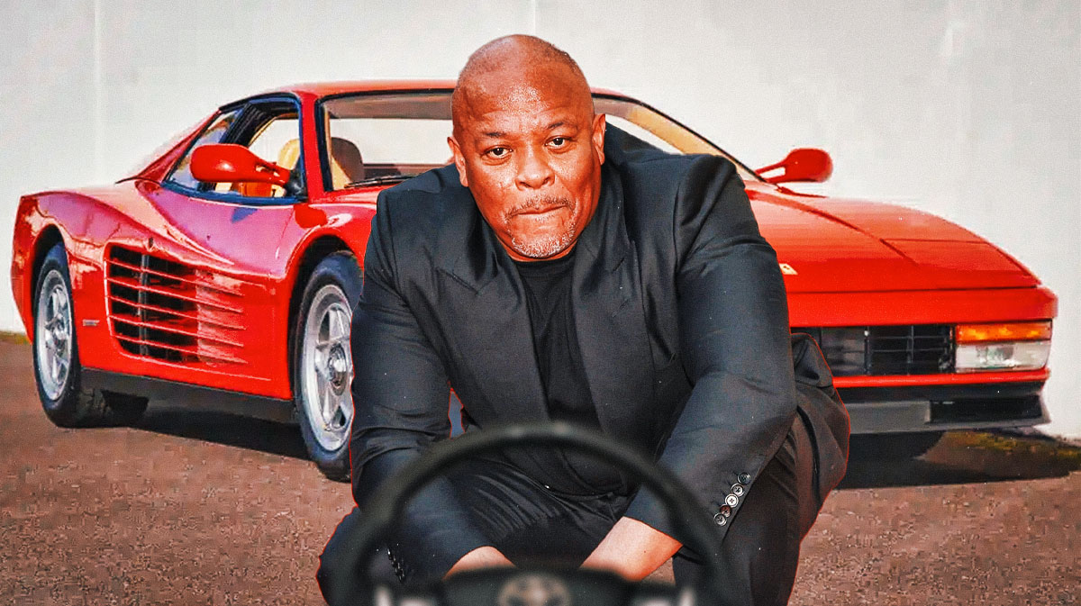 Dr. Dre in front of a car from his collection.