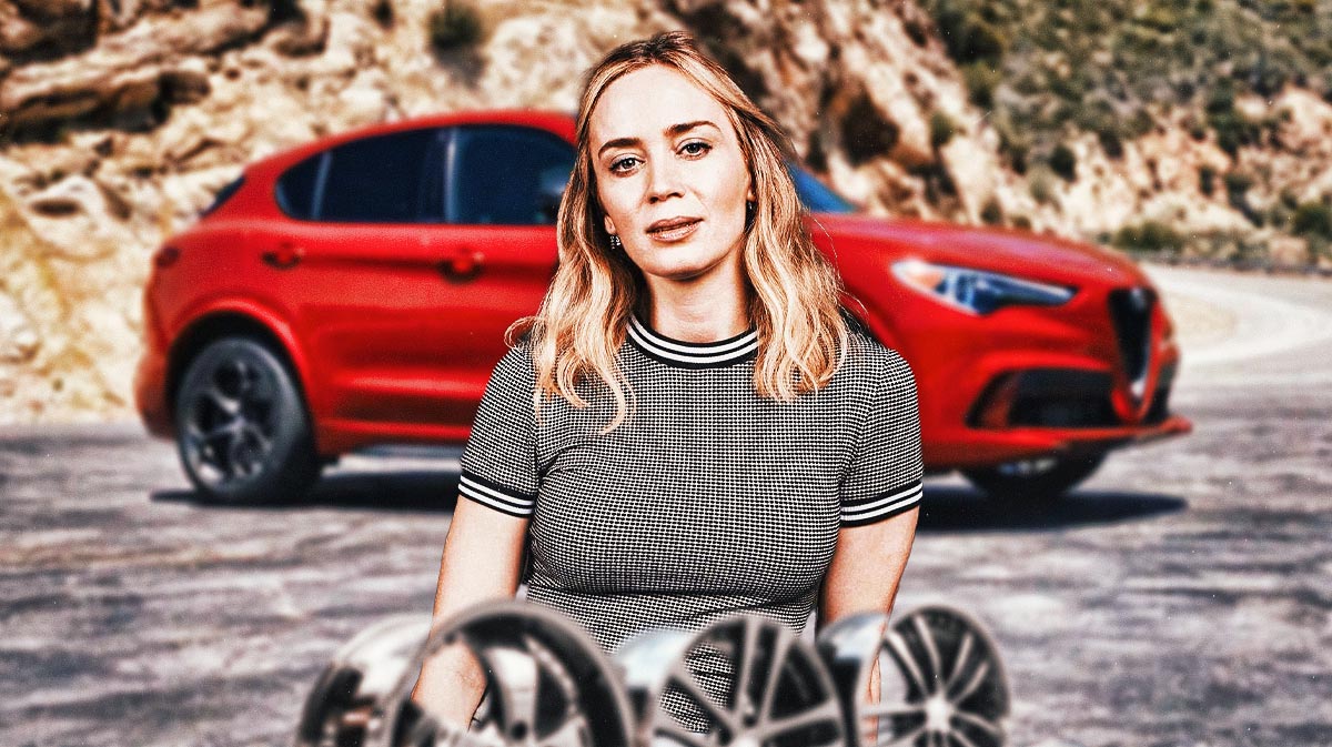 Emily Blunt in front of a car from her collection.