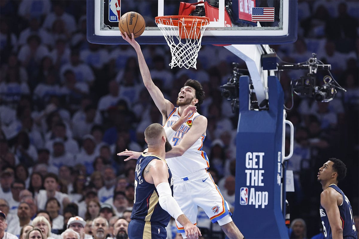 Oklahoma City Thunder forward Chet Holmgren (7) shoots as New Orleans Pelicans center Jonas Valanciunas (17) defends during the second quarter of game one of the first round for the 2024 NBA playoffs at Paycom Center. 