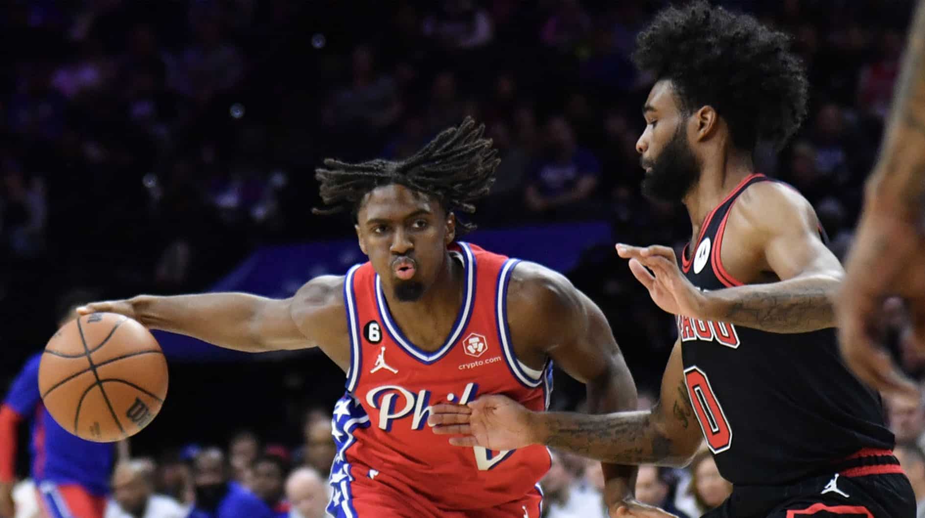 Philadelphia 76ers guard Tyrese Maxey (0) is defended by Chicago Bulls guard Coby White (0)