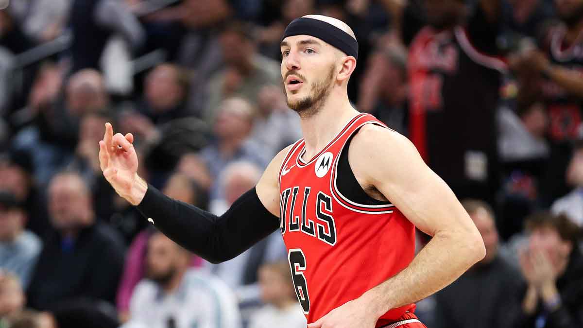 Chicago Bulls guard Alex Caruso (6) celebrates his three-point basket against the Minnesota Timberwolves during the second half at Target Center