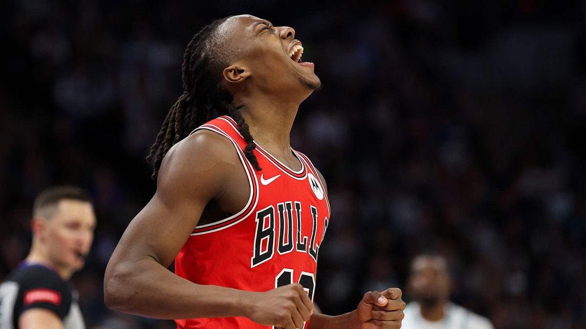 Chicago Bulls guard Ayo Dosunmu (12) celebrates during the second half against the Minnesota Timberwolves at Target Center. 