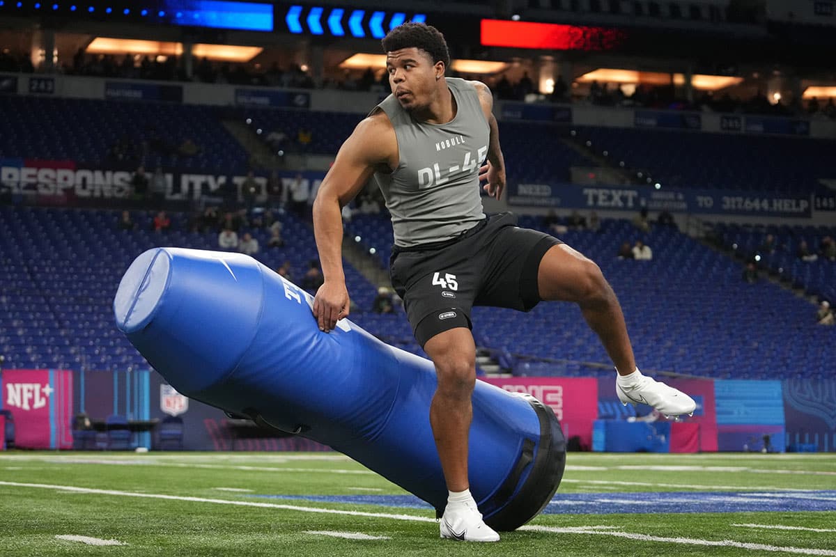 Penn State defensive lineman Chop Robinson (DL45) works out during the 2024 NFL Combine at Lucas Oil Stadium.