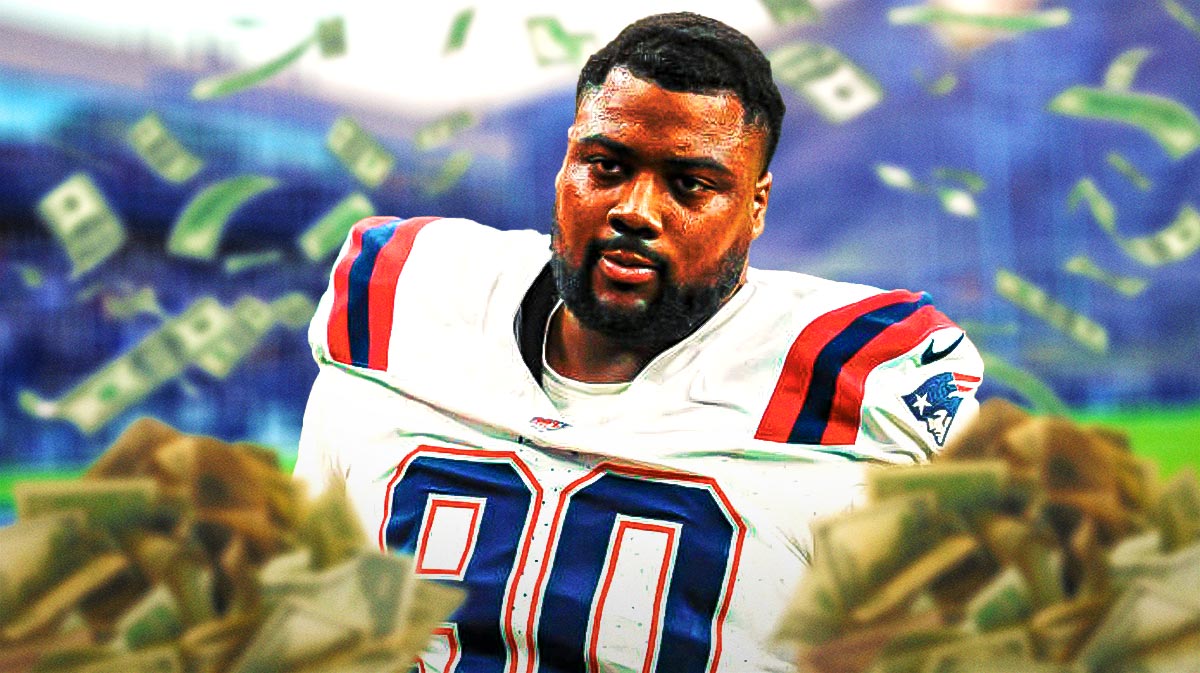 Christian Barmore with money falling around him