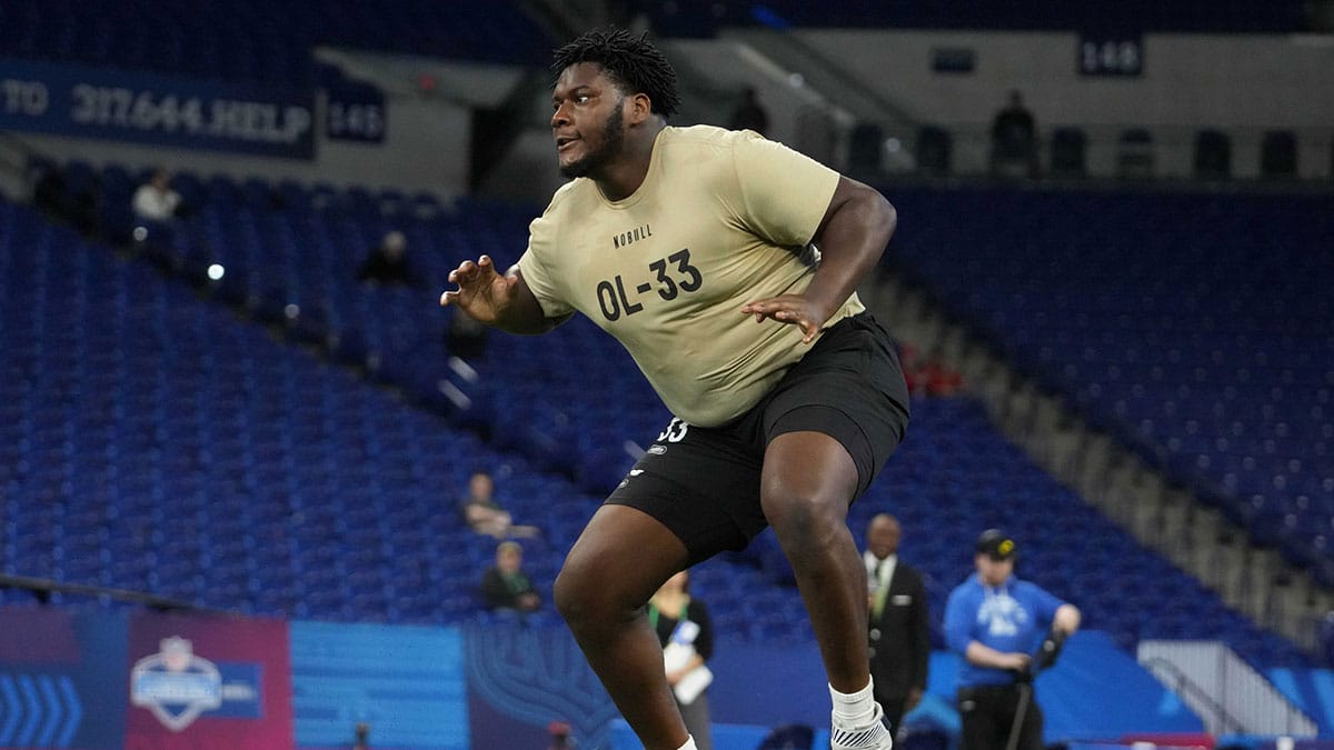 Connecticut offensive lineman Christian Haynes (OL33) during the 2024 NFL Scouting Combine at Lucas Oil Stadium