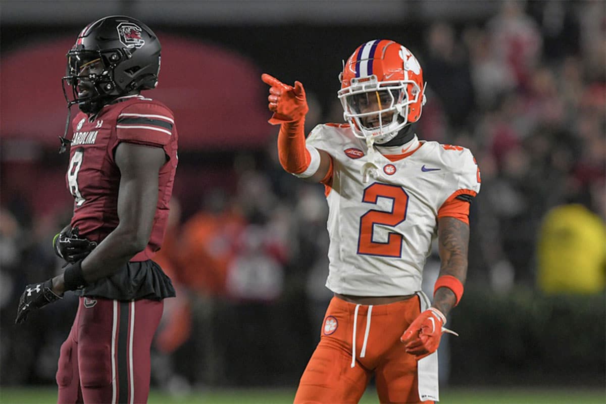 Clemson Tigers cornerback Nate Wiggins (2) smiles after breaking up a pass to South Carolina wide receiver Nyck Harbor (8) during the fourth quarter at Williams-Brice Stadium. Clemson won 16-7. 