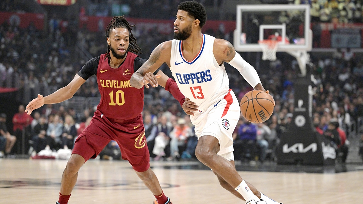 Apr 7, 2024; Los Angeles, California, USA; Cleveland Cavaliers guard Darius Garland (10) defends Los Angeles Clippers forward Paul George (13) in the first half at Crypto.com Arena. Mandatory Credit: Jayne Kamin-Oncea-USA TODAY Sports