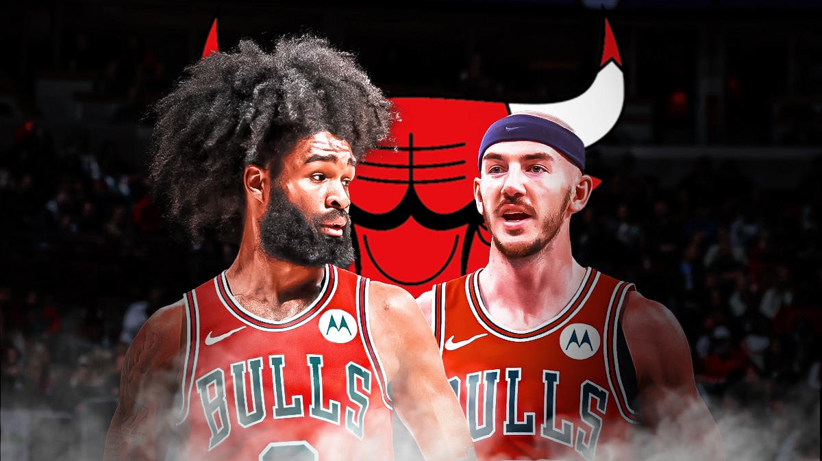 Bulls' Coby White and Alex Caruso stand in front of Magic crowd