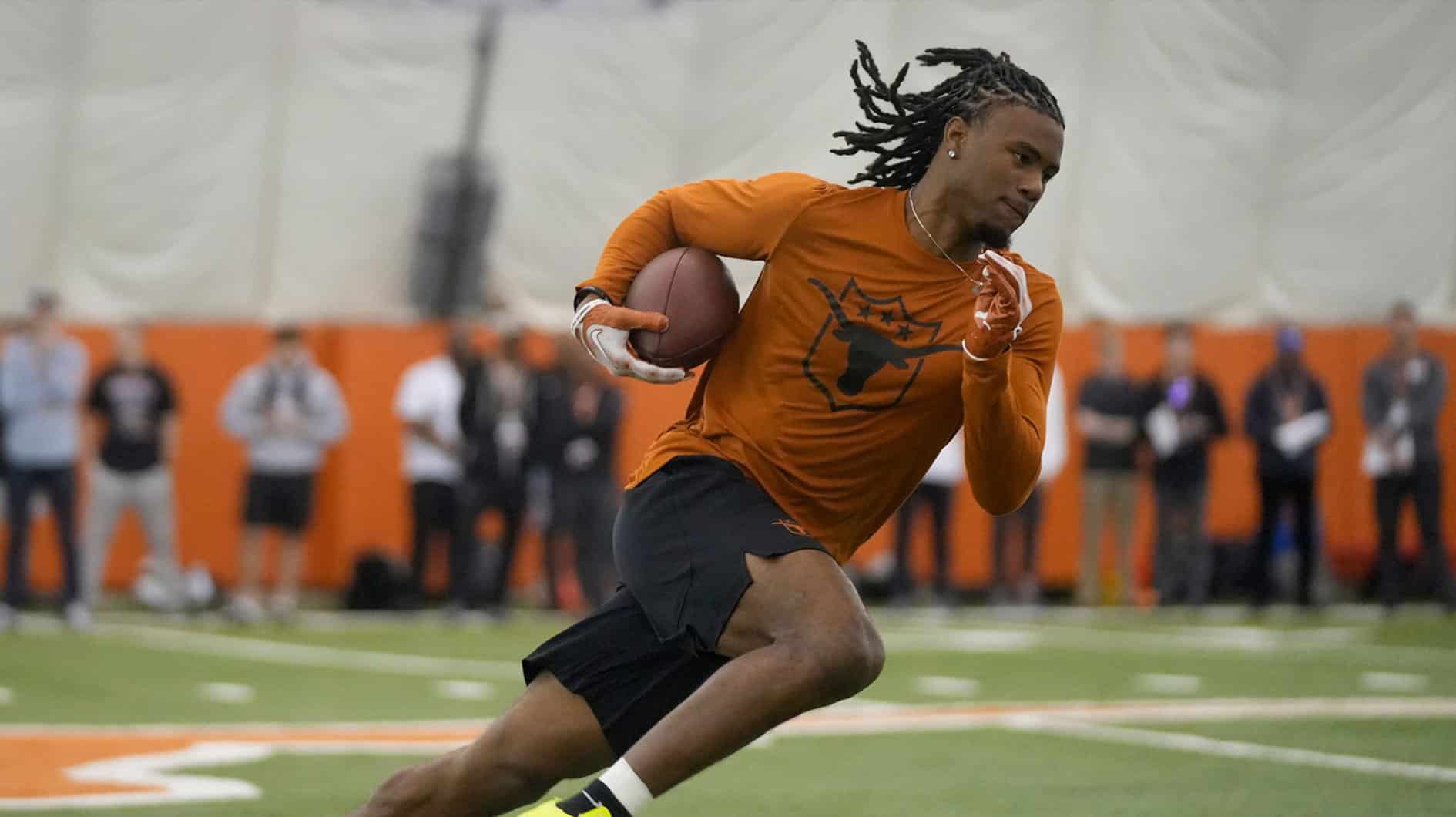 Wide receiver Adonai Mitchell goes through drills at Texas Longhorns Football Pro Day at Frank Denius Fields Wednesday March 20, 2024.
