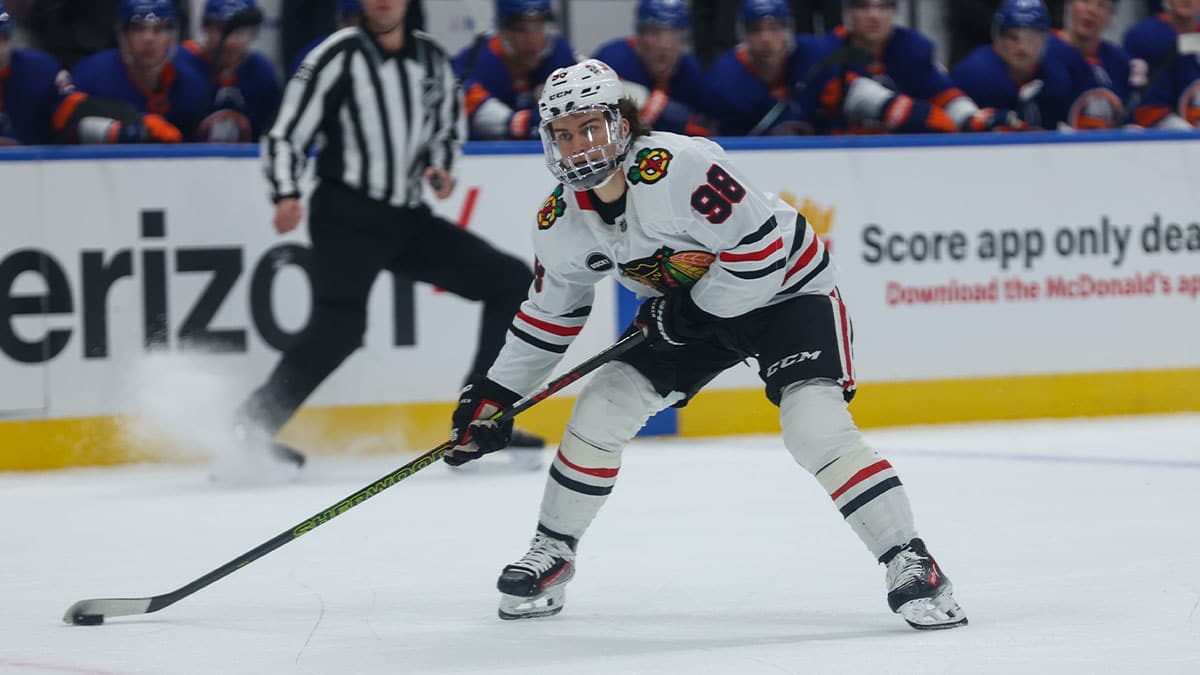 Chicago Blackhawks center Connor Bedard (98) take a shot against the New York Islanders during the first period at UBS Arena.