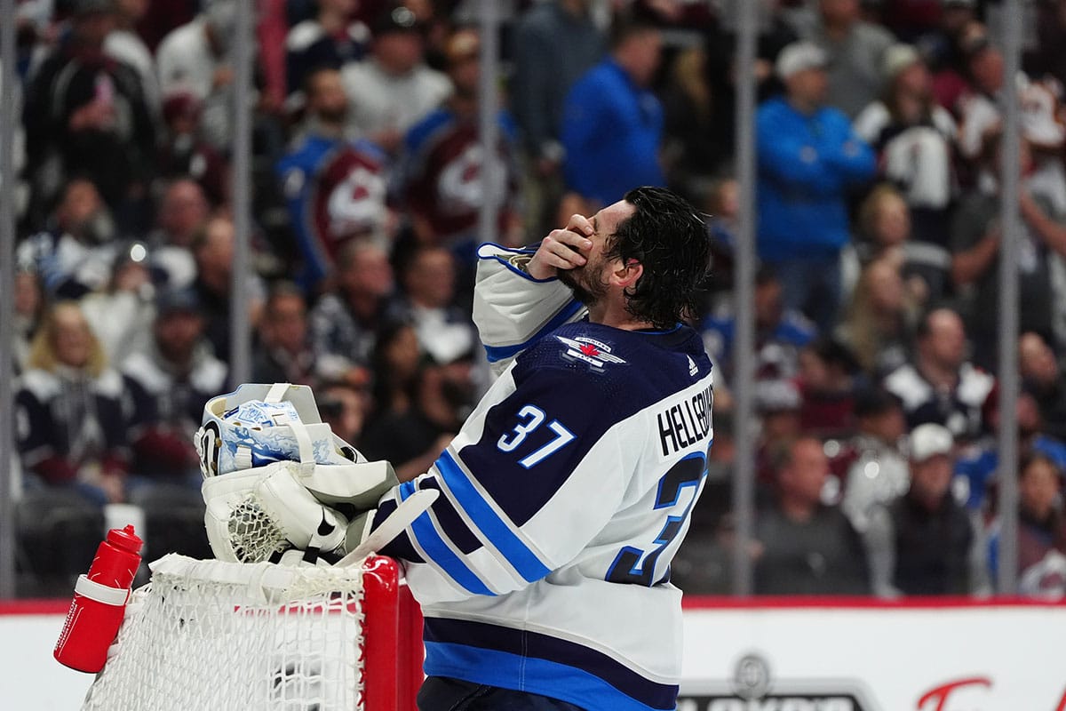  Winnipeg Jets goaltender Connor Hellebuyck (37) reacts following a goal scored by the Colorado Avalanche in the second period in game four of the first round of the 2024 Stanley Cup Playoffs at Ball Arena.