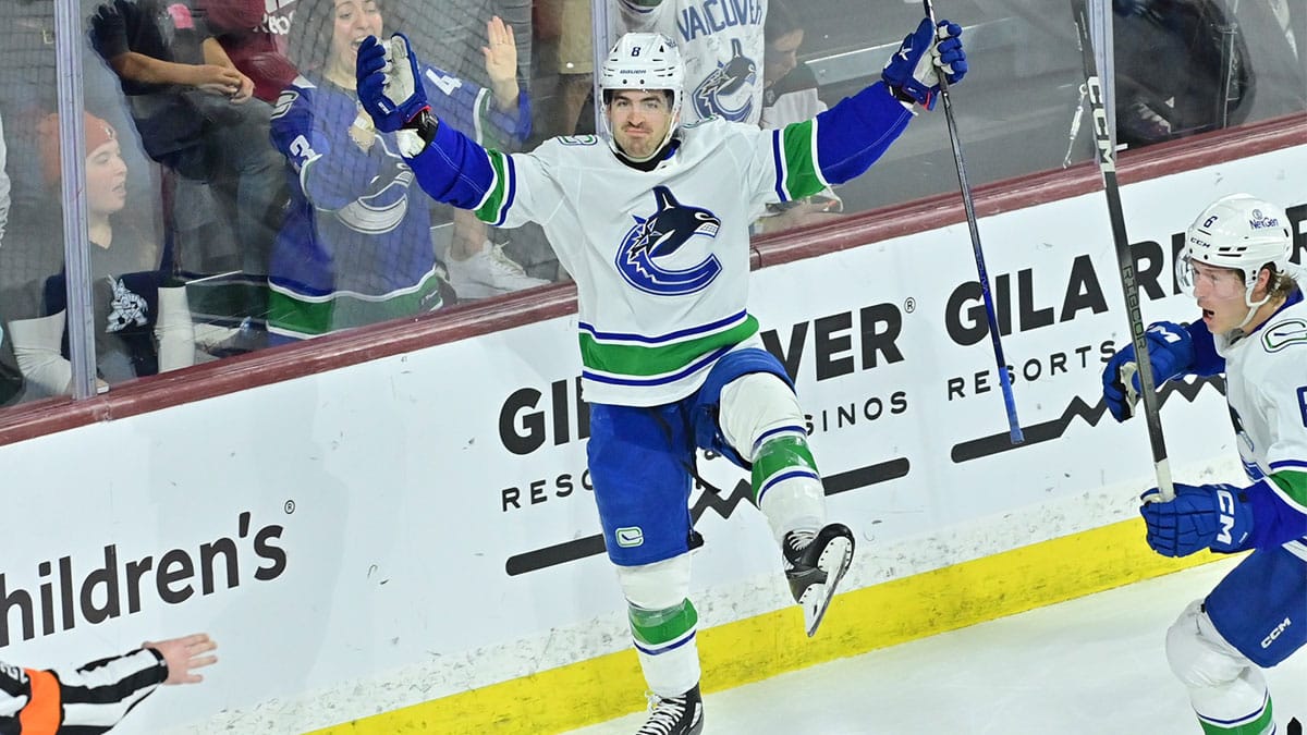 Vancouver Canucks right wing Conor Garland (8) celebrates after scoring a goal in the third period against the Vancouver Canucks at Mullett Arena.