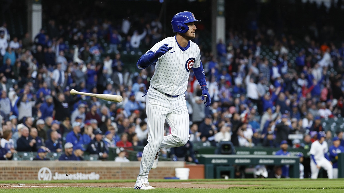 Chicago Cubs outfielder Cody Bellinger (24) watches his two-run home run against the Houston Astros during the first inning at Wrigley Field.