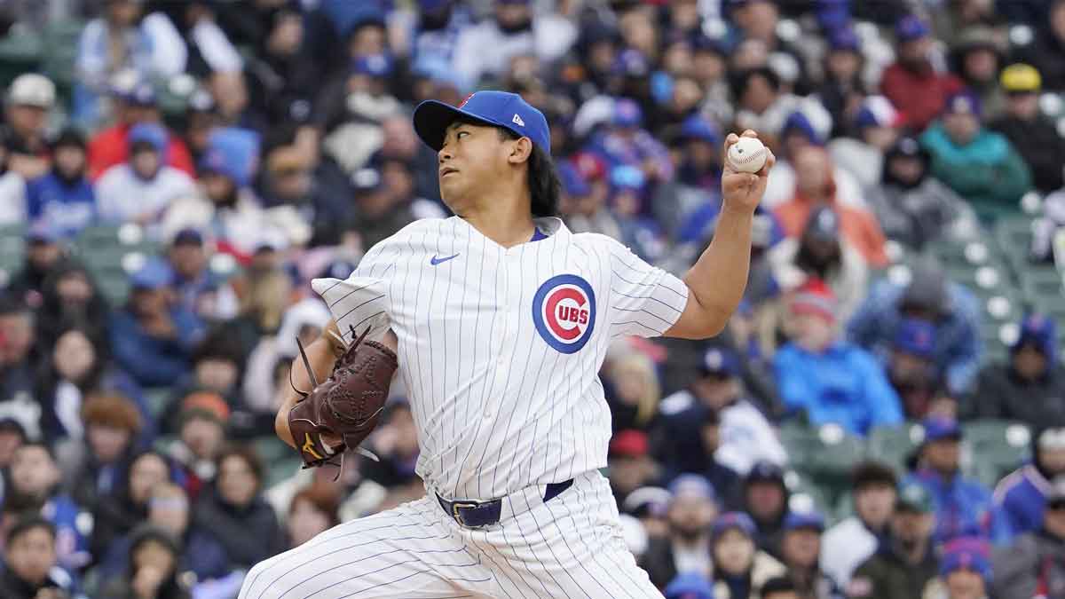 Chicago Cubs pitcher Shota Imanaga (18) pitches against the Los Angeles Dodgers during the first inning at Wrigley Field.
