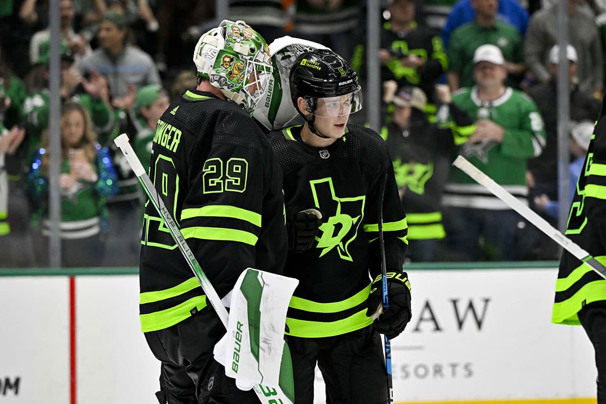  Dallas Stars goaltender Jake Oettinger (29) and defenseman Nils Lundkvist (5) celebrate on the ice after the Stars defeat the Edmonton Oilers at the American Airlines Center. 