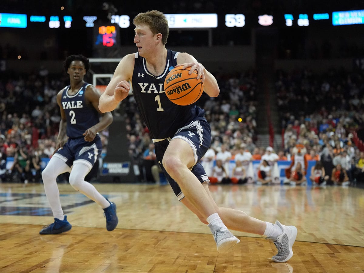Yale Bulldogs forward Danny Wolf (1) drives to the basket against the Auburn Tigers during the second half of a game in the first round of the 2024 NCAA Tournament at Spokane Veterans Memorial Arena
